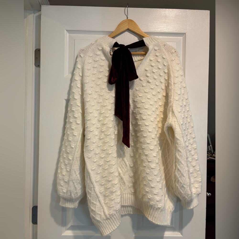 Elegant White Sweater with Burgundy tie Accent in the back